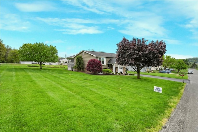 view of front of property with a front lawn