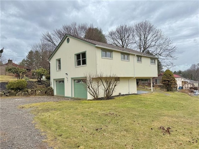 701 Mercer Rd, Twp Of But Nw, PA 16001 - view of home's exterior with an attached garage, driveway, and a yard