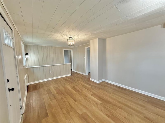 701 Mercer Rd, Twp Of But Nw, PA 16001 - empty room with light wood-type flooring and a chandelier