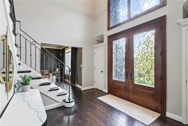 104 Ross Creek Ln, Peters Twp, PA 15367 - entryway featuring french doors, baseboards, stairs, hardwood / wood-style flooring, and a high ceiling