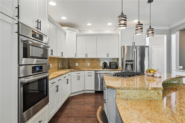 104 Ross Creek Ln, Peters Twp, PA 15367 - kitchen with appliances with stainless steel finishes, crown molding, white cabinetry, a sink, and dark wood-type flooring