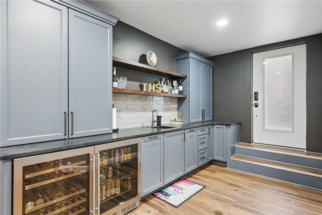 104 Ross Creek Ln, Peters Twp, PA 15367 - indoor wet bar with beverage cooler, tasteful backsplash, and light wood-style flooring