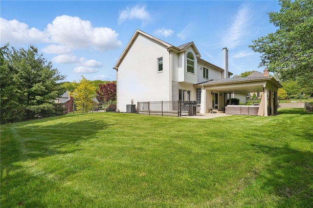 104 Ross Creek Ln, Peters Twp, PA 15367 - back of property featuring a patio, central air condition unit, outdoor lounge area, and a chimney