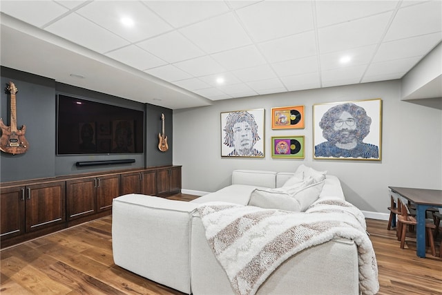 104 Ross Creek Ln, Peters Twp, PA 15367 - living area with wood finished floors, a drop ceiling, and baseboards