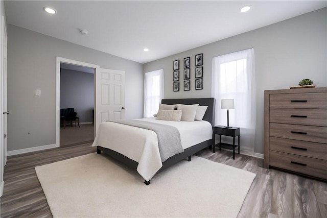 1720 Stratmore St, Crafton Heights, PA 15205 - bedroom with multiple windows, dark wood-style floors, and recessed lighting