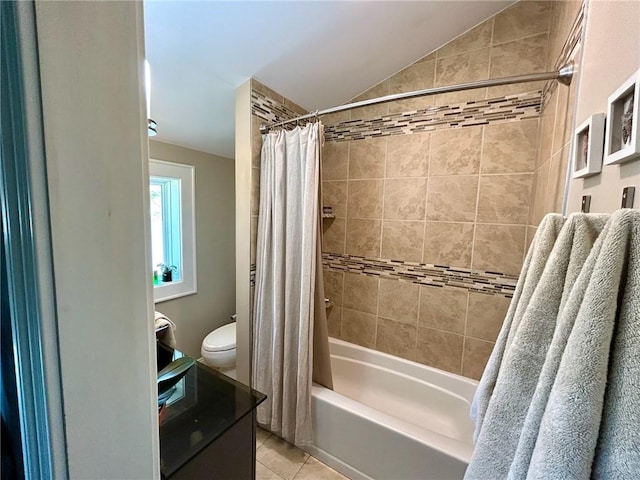 bathroom featuring shower / tub combo, tile patterned floors, toilet, and vaulted ceiling