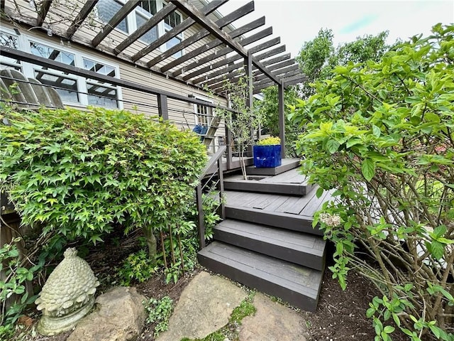 wooden terrace with a pergola
