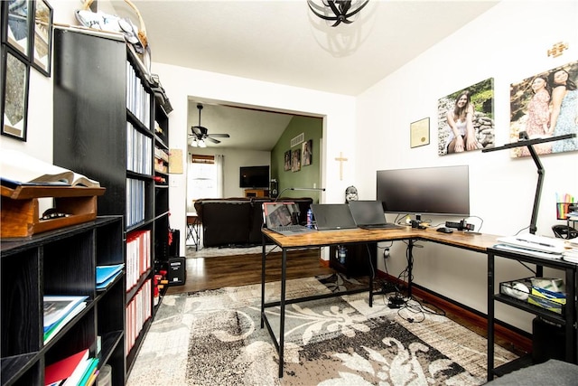 office space with a ceiling fan and wood finished floors