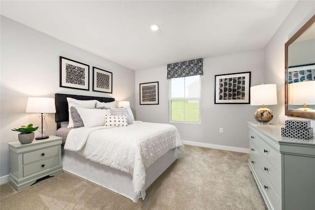 bedroom with light carpet, baseboards, and recessed lighting