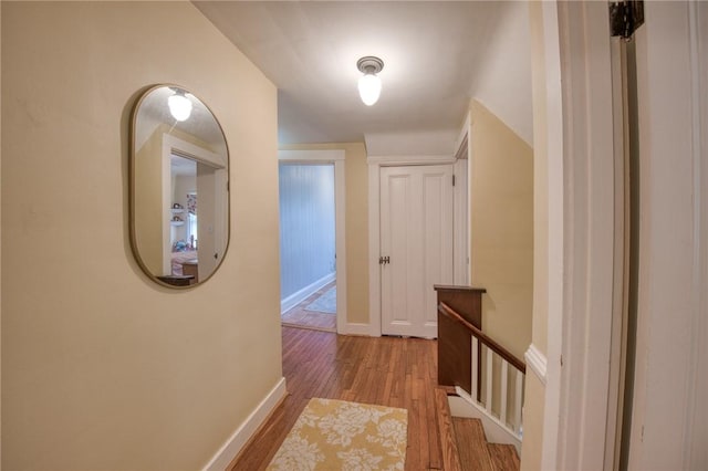 1010 Glenshaw Ave, Shaler, PA 15116 - corridor with wood finished floors, baseboards, and an upstairs landing
