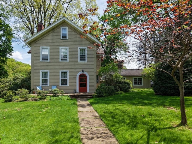 1010 Glenshaw Ave, Shaler, PA 15116 - view of front facade featuring a chimney and a front lawn