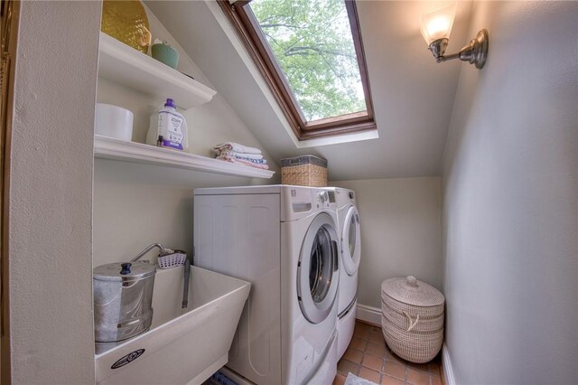 1010 Glenshaw Ave, Shaler, PA 15116 - laundry room with washer and dryer, a skylight, and tile patterned floors
