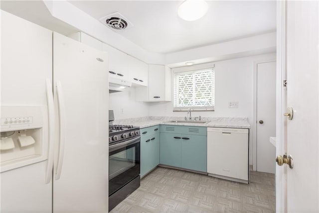 5251 Meadowgreen Dr, Whitehall, PA 15236 - kitchen with white appliances, a sink, range hood, and white cabinetry