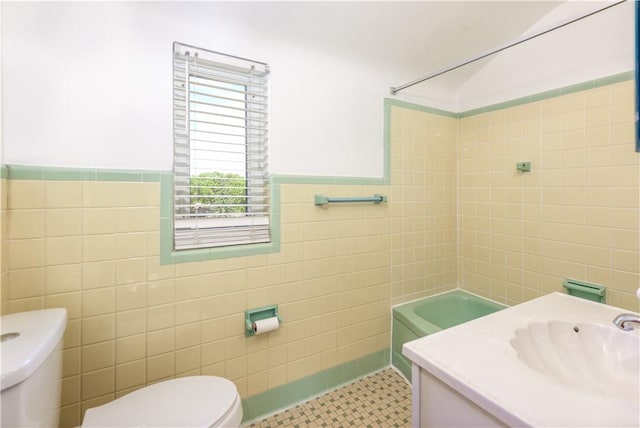 5251 Meadowgreen Dr, Whitehall, PA 15236 - full bath featuring tile walls, toilet, tile patterned flooring, vanity, and wainscoting