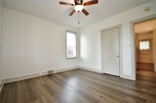 18 W Manilla Ave, Green Tree, PA 15220 - unfurnished bedroom featuring multiple windows, dark wood-style floors, baseboards, and ceiling fan