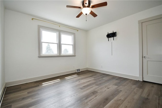 18 W Manilla Ave, Green Tree, PA 15220 - empty room featuring wood finished floors, a ceiling fan, and baseboards