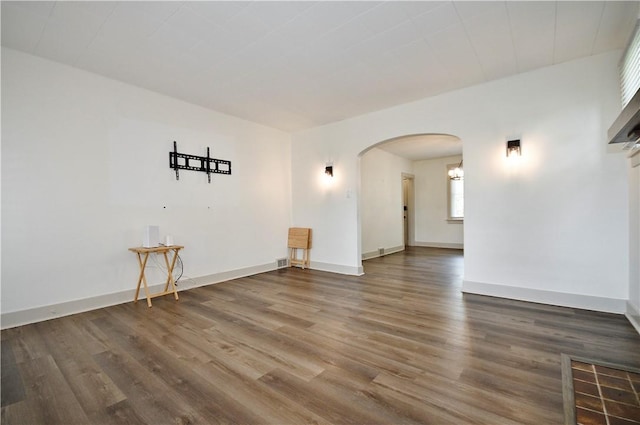 18 W Manilla Ave, Green Tree, PA 15220 - unfurnished room with arched walkways, wood finished floors, and baseboards