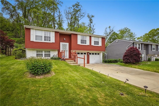 945 Key W Dr, Plum Boro, PA 15239 - split foyer home with a garage, driveway, a front yard, and entry steps
