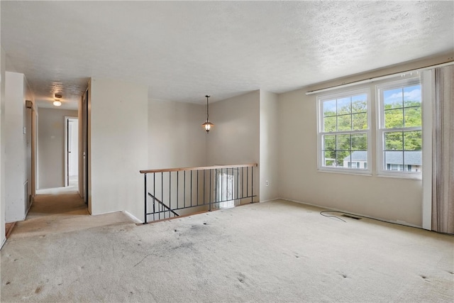 945 Key W Dr, Plum Boro, PA 15239 - carpeted empty room with a textured ceiling