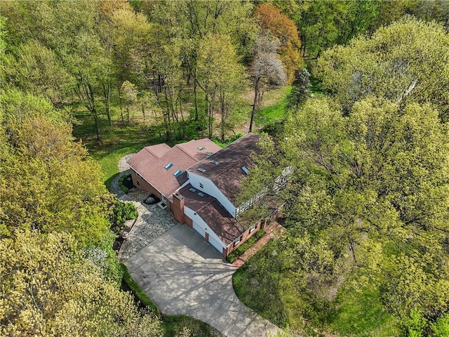view from above of property featuring a forest