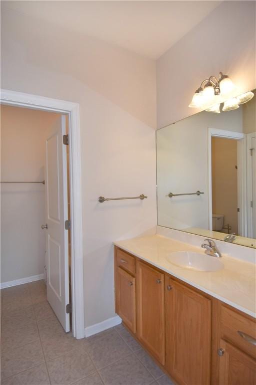 1704 Waterleaf Dr, Franklin Park, PA 15143 - bathroom featuring vanity, tile patterned floors, baseboards, and toilet
