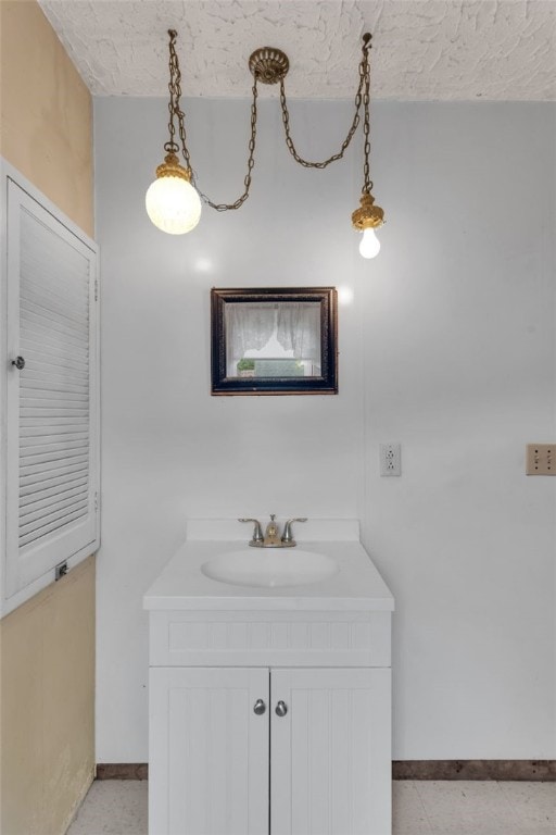 1108 Wills Ave, Lower Burrell, PA 15068 - bathroom featuring baseboards and vanity