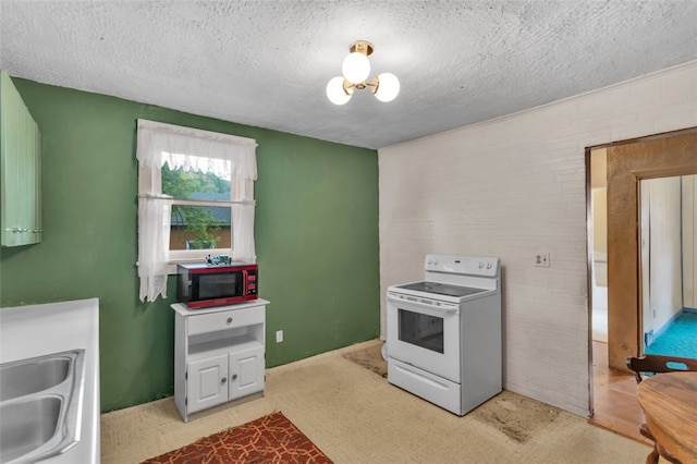 1108 Wills Ave, Lower Burrell, PA 15068 - kitchen featuring white electric stove, a sink, a textured ceiling, and light colored carpet