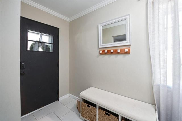 entrance foyer featuring crown molding, light tile patterned floors, and baseboards