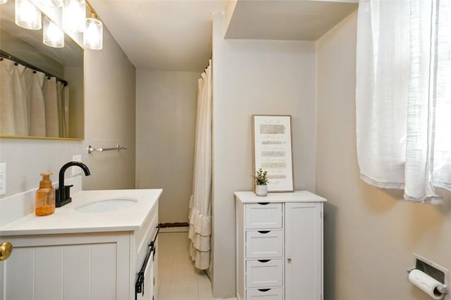 bathroom with vanity and tile patterned floors