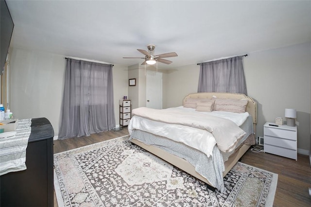 bedroom featuring wood finished floors and a ceiling fan