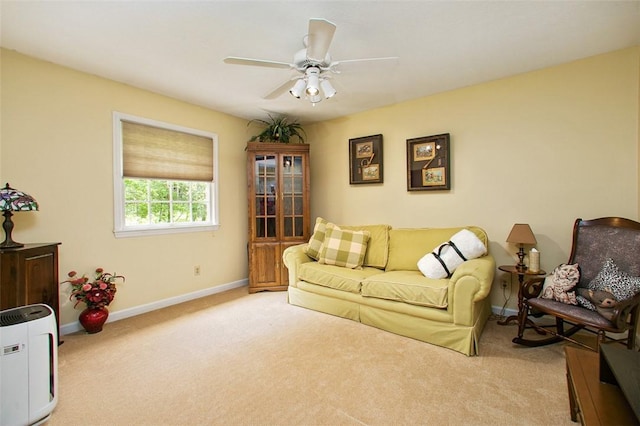 707 Cherry Blossom Ct, Murrysville, PA 15626 - living room with light colored carpet, baseboards, and a ceiling fan