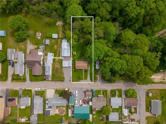 view of property location featuring property boundaries highlighted and nearby suburban area