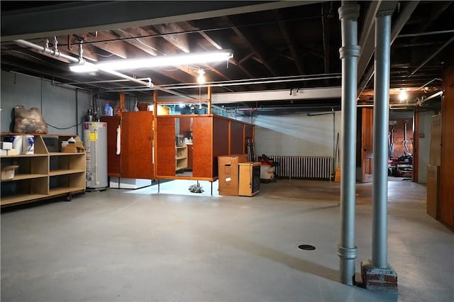 unfinished below grade area featuring gas water heater