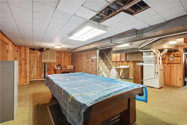 game room featuring light colored carpet, pool table, heating unit, and wooden walls