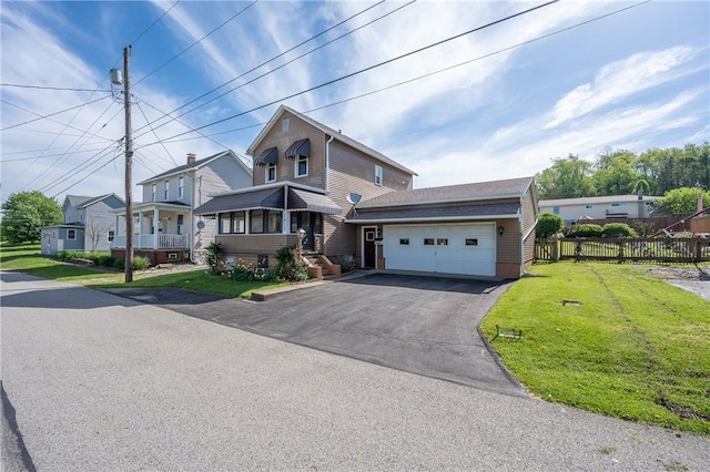 view of front of house with an attached garage and driveway