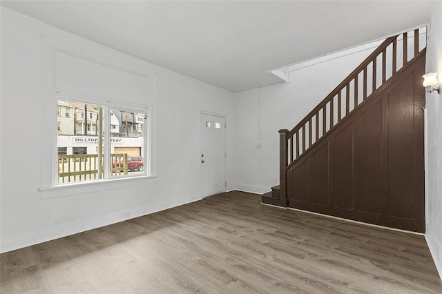 2633 S 18th St, Mount Oliver, PA 15210 - entryway featuring stairs, wood finished floors, and baseboards