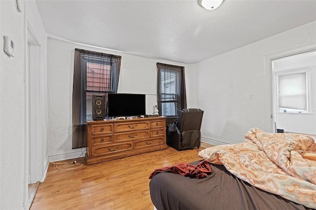 2633 S 18th St, Mount Oliver, PA 15210 - bedroom with light wood-style flooring and baseboards