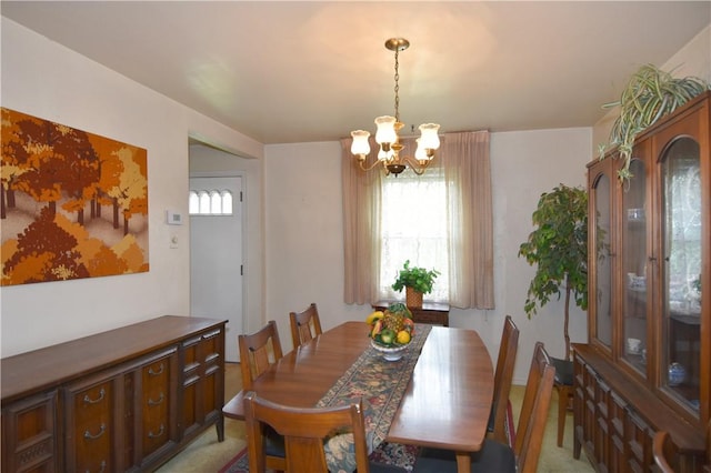 dining room featuring a chandelier