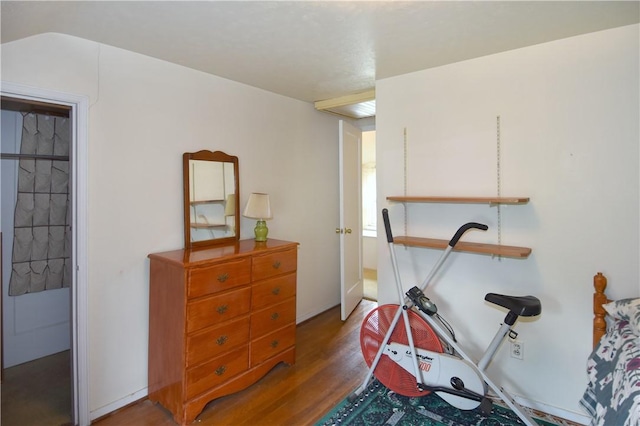 exercise area with wood finished floors