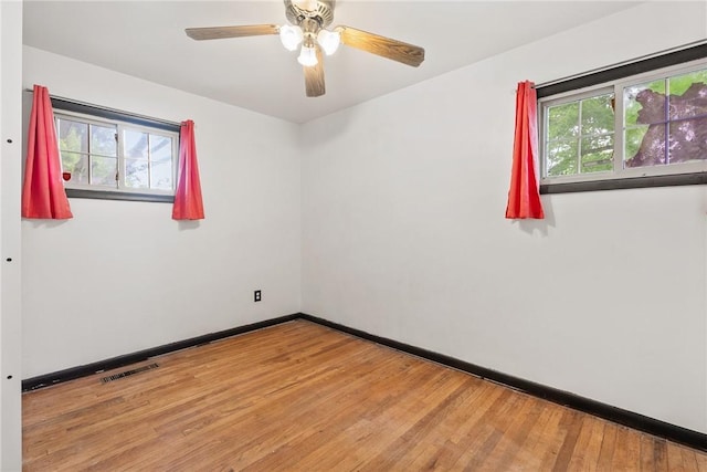 1024 Maine Ave, Hopewell Twp Bea, PA 15001 - empty room with light wood-style floors, a ceiling fan, and baseboards