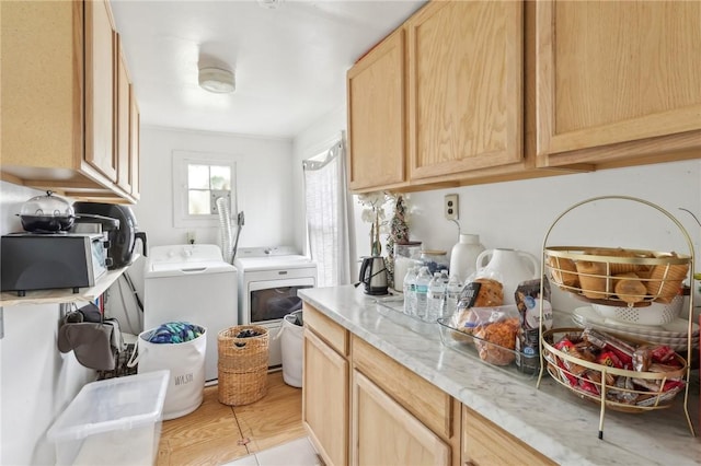 washroom featuring washing machine and dryer