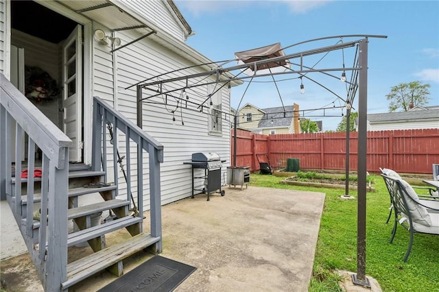 view of patio / terrace with grilling area and cooling unit