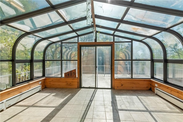 unfurnished sunroom featuring baseboard heating and lofted ceiling