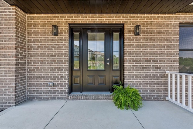 1621 Windsor Rd, North Huntingdon, PA 15642 - view of exterior entry featuring brick siding