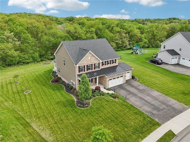 view from above of property with a forest