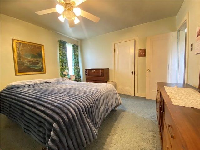 bedroom with carpet floors and a ceiling fan