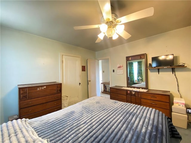 bedroom featuring a ceiling fan and carpet flooring
