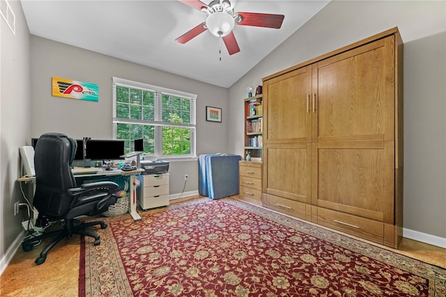 office space featuring baseboards, lofted ceiling, and ceiling fan