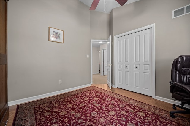 office featuring ceiling fan and baseboards