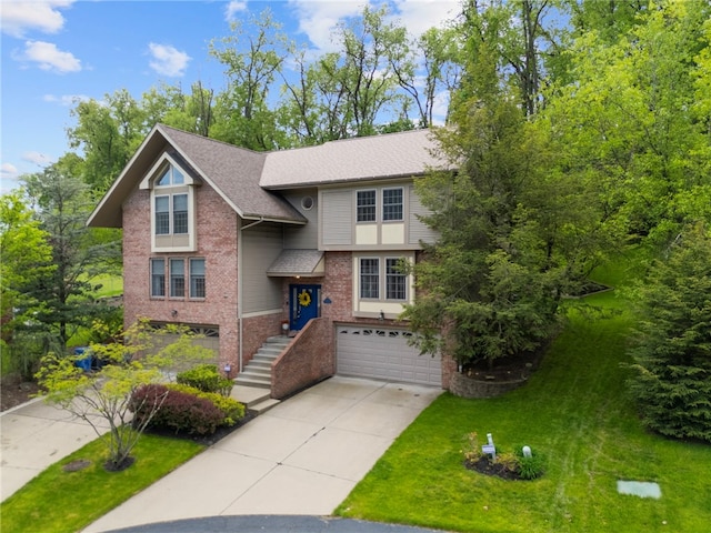view of front of house featuring concrete driveway, an attached garage, brick siding, a front lawn, and a shingled roof